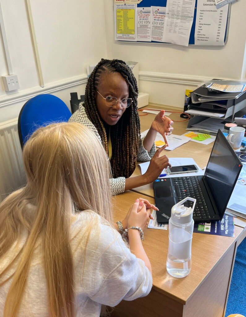 CRCB Outreach Officer providing helpdesk support to a centre user