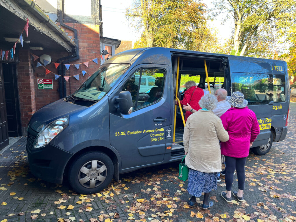 People boarding one of the CRCB minibuses